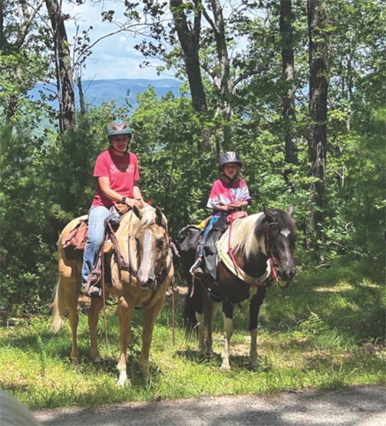 Tootie and her sister Savannah on their 100-mile ride.