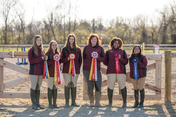 Magna Carta IEA team coach and her students. She is also a trainer for the New Vocations Racehorse Adoption program that helps Standardbred racehorses find new careers.