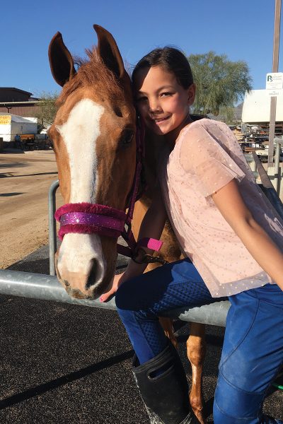 Enaya Carroll with her horse, Thor