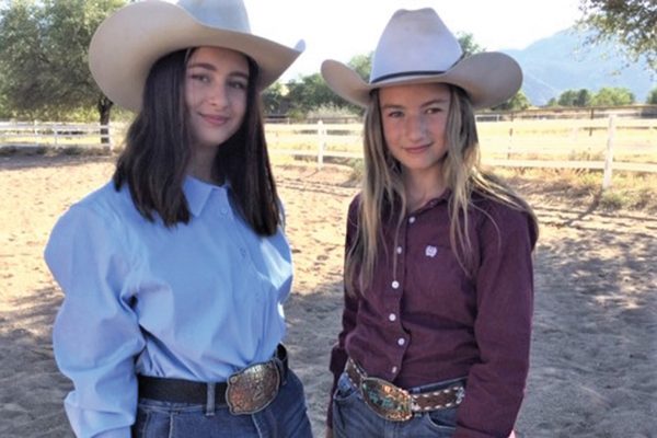 Two sisters in western riding attire