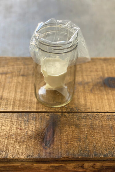 A frosting bag in a mason jar