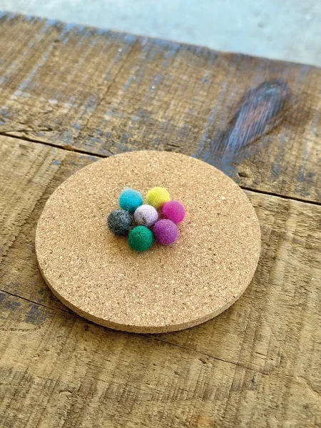 The materials needed for creating a coaster.