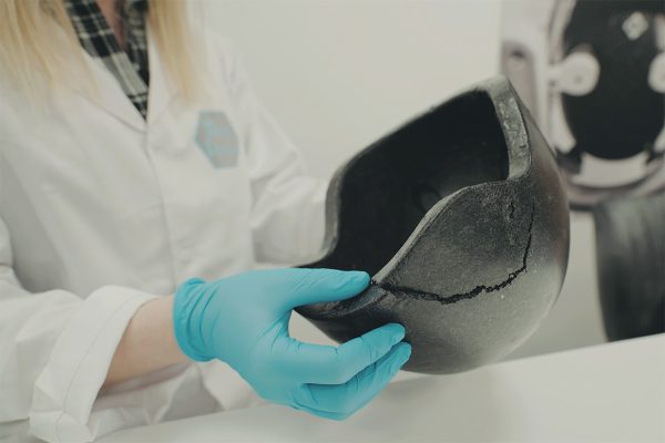 The interior of Esme's helmet with damage to it after falling off her horse.