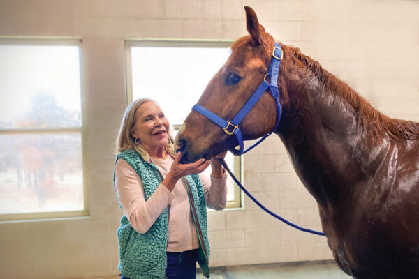 Ramona Caldwell, who has the unique career as an equine rehab/spa owner, with a horse