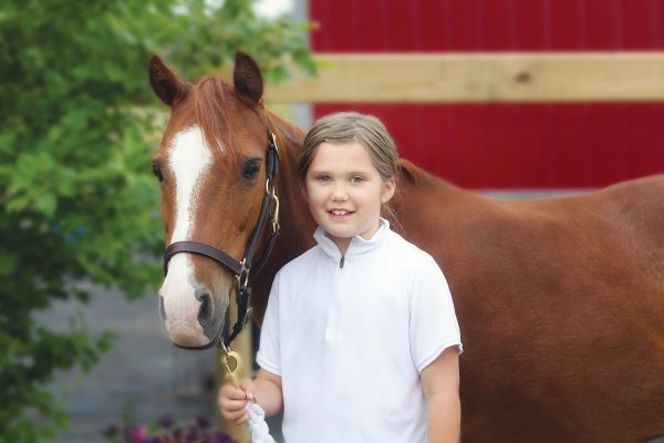 A girl with her pony