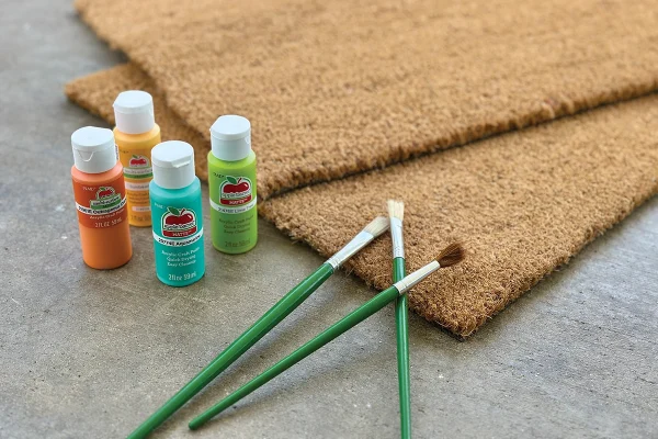 Paint and paintbrushes.