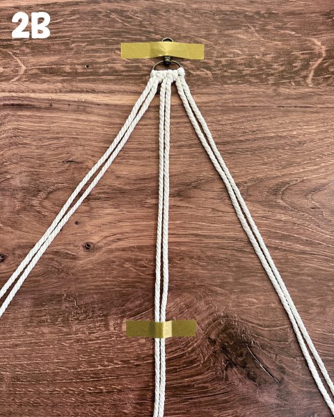 Thread taped to a work surface.