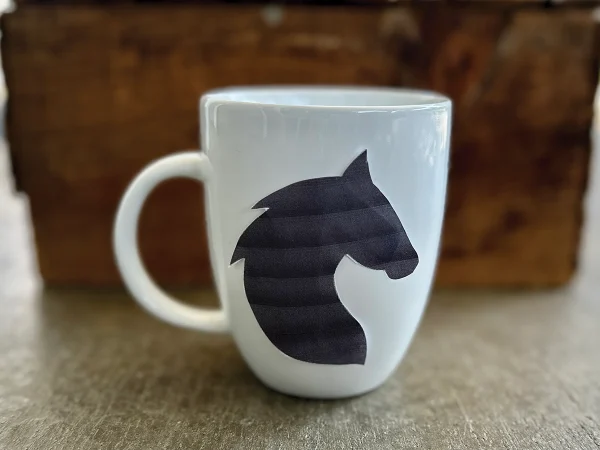 Materials needed for creating a mug.