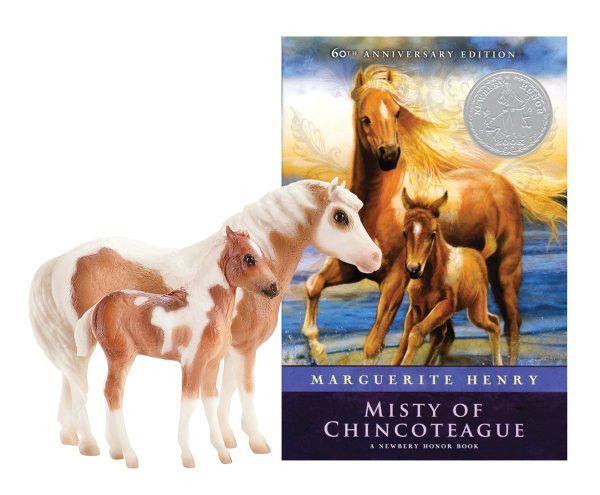 The Misty of Chincoteague Breyer model as a set with foal Stormy and the Marguerite Henry book that made her famous.