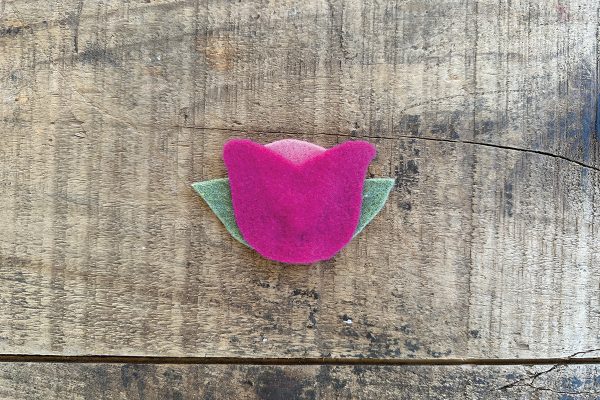 A flower cut out from felt.