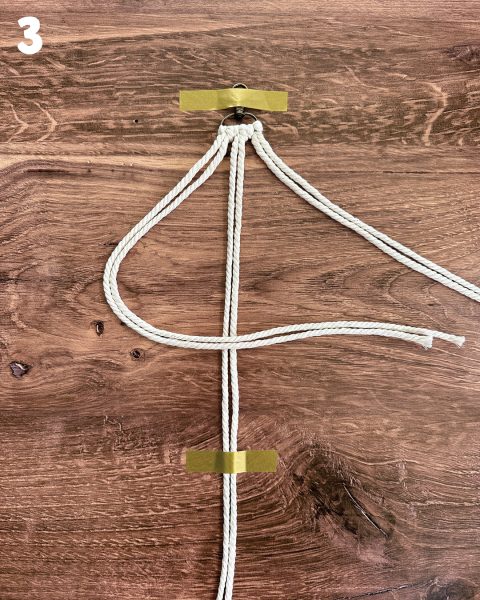 Crossing the thread over to look like the number 4 in step 3 of creating a DIY horsey keychain.