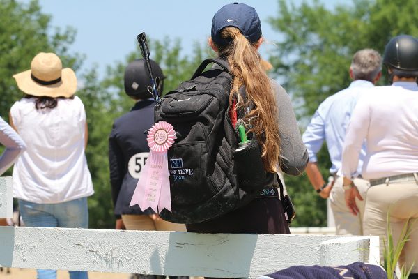 A groom at a horse show