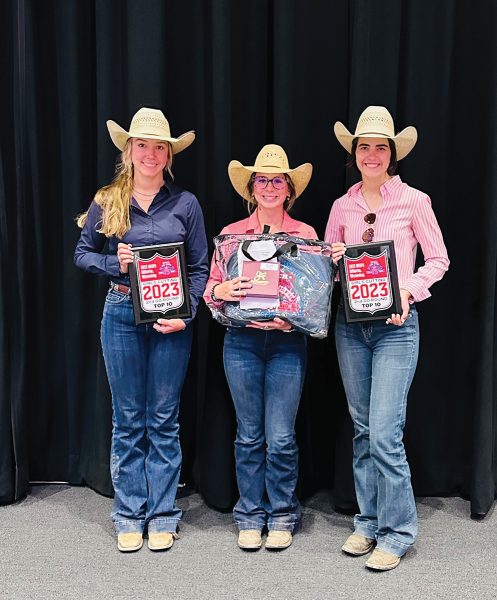 Three youth cutting riders wearing their apparel for the western event, featuring trouser jeans.