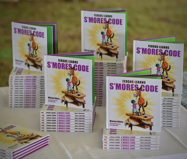 A display of the S'MORES CODE book.