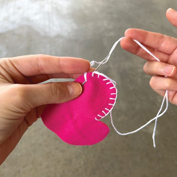 Sewing together a DIY hand warmer