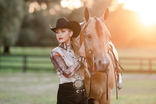 A portrait of a western pleasure horse and equestrian