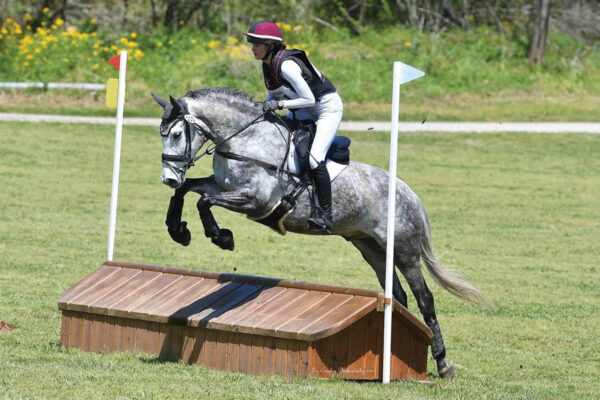 A USPA student competing in eventing