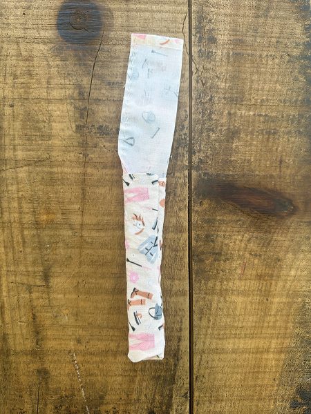 The sides of the fabric strip sewed together.