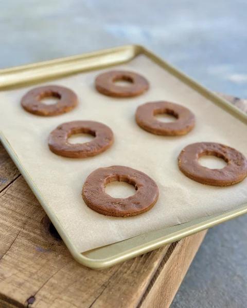 Donut horse treats after being frosted.