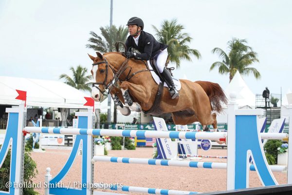 Kent Farrington and his horse Creedance, a hony, clear a huge jump