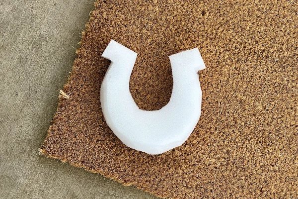 A foam cutout of a horseshoe.