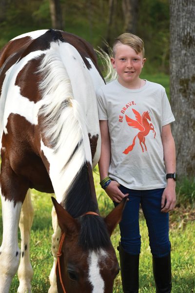 The Mare Goods Be Brave Kids Tee, a perfect addition to anyone equestrian holiday gift list.