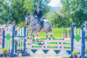 Gracie Elliott Competing in Show Jumping at NAYC 