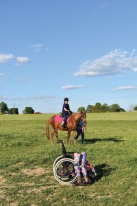 Jewell Cox riding her horse.